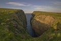 A narrow inlet in the cliffs near John O`Groats in the Scottish Highlands