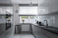 Narrow kitchen with modern furniture Royalty Free Stock Photo