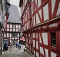 Narrow lanes and crooked half-timbered homes in Limburg, Germany.