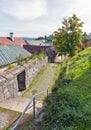 Narrow medieval street in Old Town of Banska Stiavnica, Slovakia. Royalty Free Stock Photo