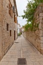 Narrow medieval street in Trogir, Croatia