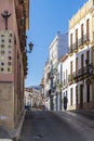 Narrow old main street Calle ArmiÃÂ±ÃÂ¡n Ronda Spain Royalty Free Stock Photo