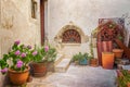 Narrow old street and yard in Sibenik city, Croatia, medieval zone