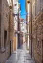 Narrow old streets and yards in Sibenik city, Croatia Royalty Free Stock Photo