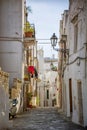 Narrow old urban street in italian town Royalty Free Stock Photo