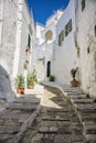 Narrow old urban street in italian town Royalty Free Stock Photo