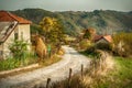 Narrow pass road winds through beautiful mountain village