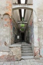 Narrow pass between two old buildings on Kapitulska street