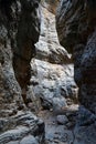 A narrow passage between the rocks of the Imbros Gorge on the island of Crete Royalty Free Stock Photo