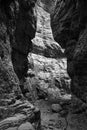 A narrow passage between the rocks of the Imbros Gorge on the island of Crete Royalty Free Stock Photo