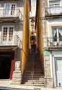 A narrow passage with a stairs between the houses in the old town of Porto Ribeira district, Portugal Royalty Free Stock Photo