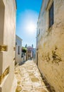 Narrow passage between stone walls, Lefkes, Greece Royalty Free Stock Photo