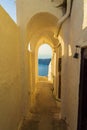 Narrow passageway in Imerovigli village resort Santorini scenery Greece