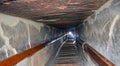 Narrow passge leading to the burial chamber inside the red north pyramid of Dahshur of king Sneferu, named for the rusty reddish