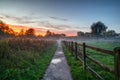 Narrow path in the Smallbrook Meadows Nature Reserve, Warminster at sunset