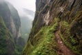 narrow path winding around steep mountain cliff