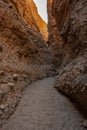 Narrow Pathway Snakes Through The Tall Walls of Sidewinder Canyon