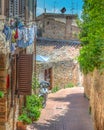 Narrow paved alley in world famous San Gimignano Royalty Free Stock Photo