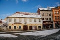 Narrow picturesque street with baroque and renaissance historical buildings in winter sunny day beautiful cityscape of royal