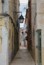 Narrow, quaint street in city Setubal