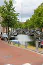 Narrow river channel in the city centre of Haarlem Royalty Free Stock Photo