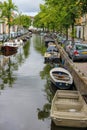 Narrow river channel in the city centre of Haarlem Royalty Free Stock Photo