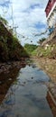 The narrow river outskirts of the city dries up Royalty Free Stock Photo