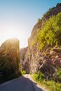 Narrow road pass between rocky cliffs vertical Royalty Free Stock Photo