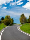 Narrow rural asphalt road in the mountains Royalty Free Stock Photo