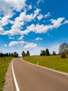 Narrow rural asphalt road in the mountains Royalty Free Stock Photo