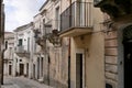 Narrow scenic street in Baroque town Ragusa with traditional townhouses, UNESCO World Heritage Site. Sicily, Italy.