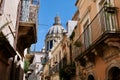 Narrow scenic street in Baroque town Ragusa with traditional townhouses, UNESCO World Heritage Site. Sicily, Italy.