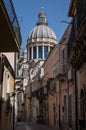 Narrow scenic street in Ragusa, Sicily, Italy with old townhouse