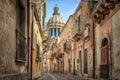 Narrow scenic street in Ragusa, Sicily, Italy Royalty Free Stock Photo