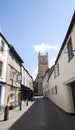 A narrow side street leading to the town centre in Cirencester, Gloucestershire, UK Royalty Free Stock Photo