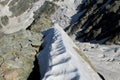 Narrow snow path in the mountain