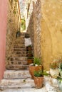 Narrow stairs between two old houses