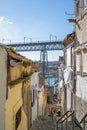 Narrow steep alley in the old town of Porto