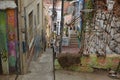 The narrow steep streets of Valparaiso with the painted walls of houses