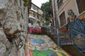 The narrow steep streets of Valparaiso with the painted walls of houses