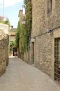 Narrow stone alley in Girona village