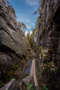 Narrow stone canyon called Peklo on the top of Table mountains Royalty Free Stock Photo