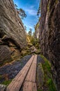 Narrow stone canyon called Peklo on the top of Table mountains, Szczeliniec Wielki in National Park Stolowe Mountains Royalty Free Stock Photo