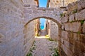 Narrow stone mediterranean street in Prvic Sepurine village Royalty Free Stock Photo