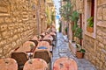 Narrow stone restaurant street in old Mediterranean town of Korcula Royalty Free Stock Photo