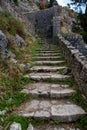 Narrow stone road to the fortress wall Royalty Free Stock Photo