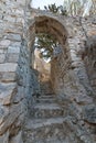 Narrow stone stairs and arch to Mirabella castle Croatia