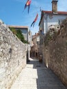 Charming narrow street in old city centre of Rab Croatia
