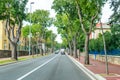 Narrow Straight Highway Road with Vehicles Crossing the a Beautiful Peaceful Town in Croatia