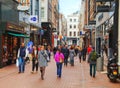 Narrow street of Amsterdam crowded with tourists Royalty Free Stock Photo